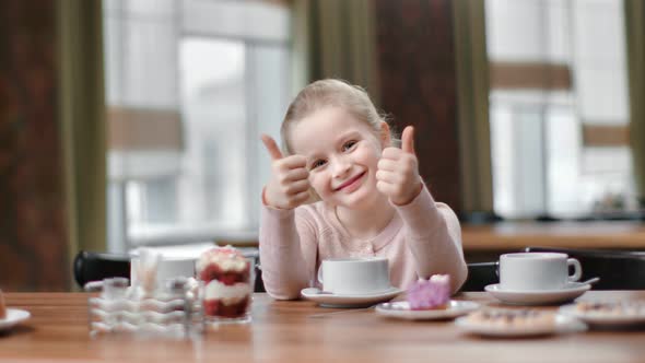 Portrait Girl Laughing Showing Cool Thumbs Up Posing at Cafe alt