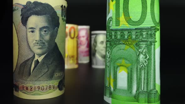 Foreign currency money exchange concept. Many banknotes of different nations. alt