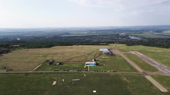 Wonderful View Filmed From Above of an Aerodrome Located on Top of a Hill in Europe alt