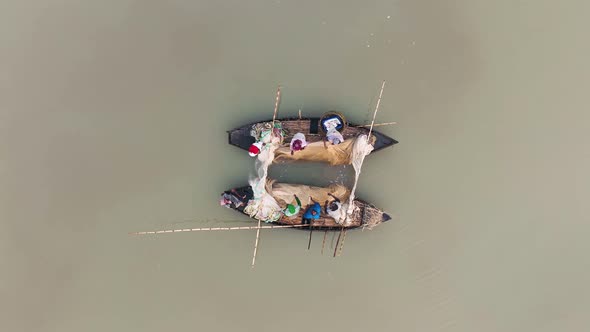 Aerial view of traditional canoe used for fishing in Bengali river, Bangladesh. alt