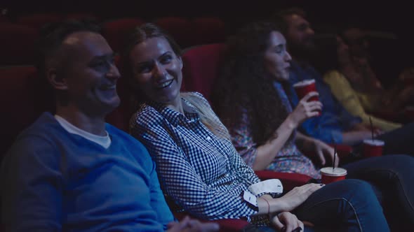 Wife and Husband in Movie Theater alt