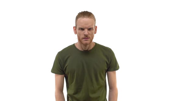 Slowmo Agressive Angry Redhead Young Bearded Redhead Guy Big Ears Looking Wrath Anger and Rage alt