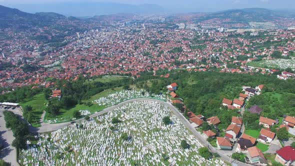 Flying over Bosnian town with Muslim graveyards alt