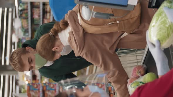 Placing Food Products On Conveyor Belt alt