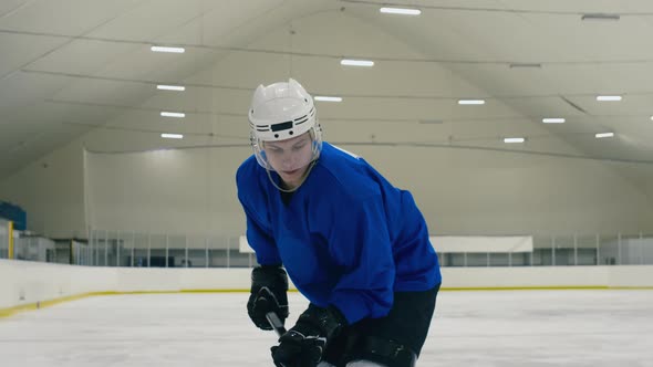 Ice hockey player training his skills