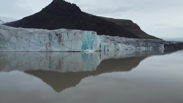 Approaching Drone Flight to Massive Glaciar Cracks Iceland
