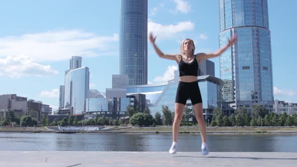 Woman working out in city