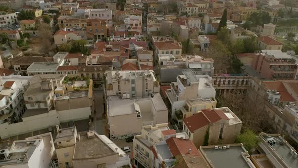 Aerial view of the parthenon temple on acropolis hill and the skyline of Athens. alt