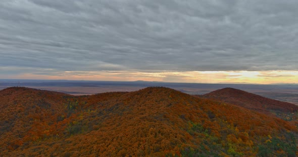 Aerial Top View Amazing Mountain Landscape with Vivid on the Colorful Autumn Forest alt