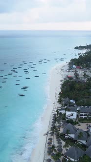 Boat Boats in the Ocean Near the Coast of Zanzibar Tanzania Slow Motion Vertical Video alt