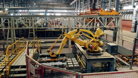 Robotized Complex, Robot Manipulator Worling at Modern Factory. alt