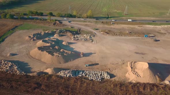 Aerial View of Storage Place of Building Materials Sush As Sand and Cement alt