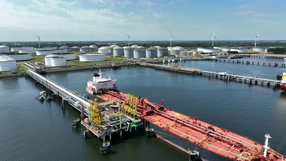 Crude Oil Tanker Ship Unloading Petrochemicals to a Fuel Depot alt