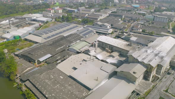 Aerial top view of factory industry. Electricity tower building in energy, transportation, logistic alt