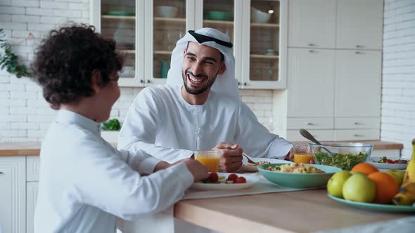 arabian family spending time together at home alt