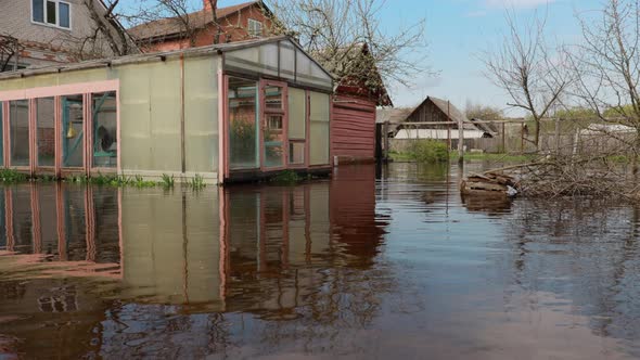 Vegetable Garden Beds In Water During Spring Flood Floodwaters During Natural Disaster alt