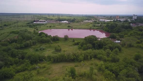 Reservoir with Pink Water, Aerial View, Ecological Catastrophe