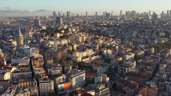 footage of bosphorus in the sunset having galata tower in the middle alt