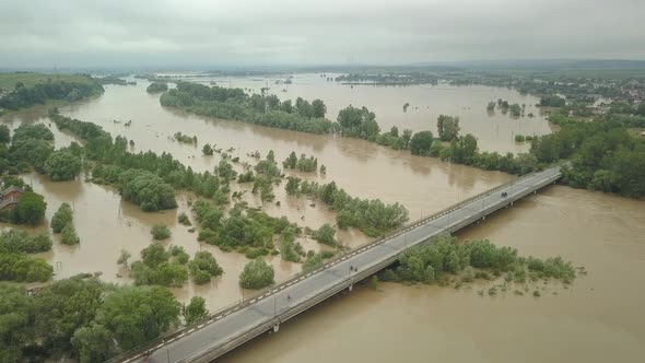 Top View of the Bridge Over the Dniester River During Floods. Spilled River, Climate Change, Natural