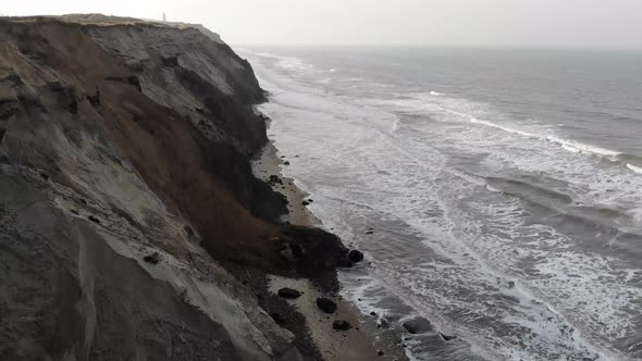 Aerial view of the Lighthouse and steep slopes at Rubjerg Knude by the North Sea, Denmark alt