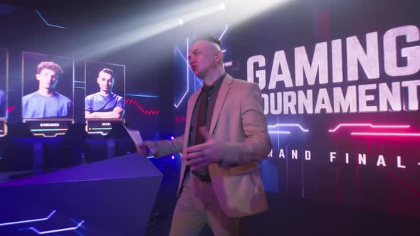 Man Announcing Start of Esports Championship alt
