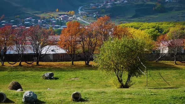 Mountain Kazbek Mkinvartsveri and Town Stepantsminda Autumn Colors of Georgia alt