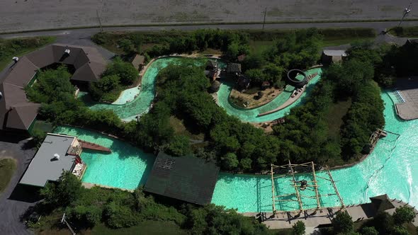 empty waterpark resort lazy river aerial alt