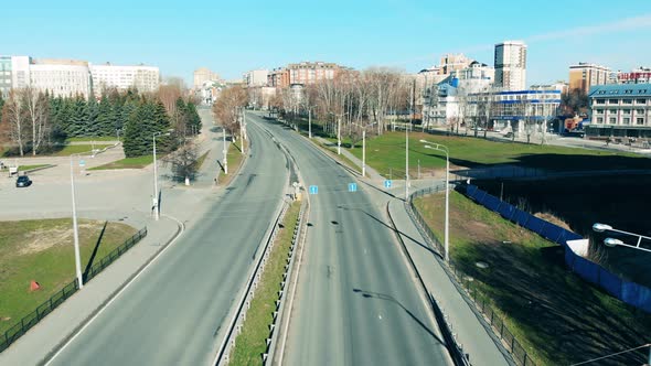 Quarantined City with Low Traffic on Its Roadway alt