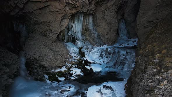 Sultan Waterfall Rushes Down in the DjilySu Tract in the Caucasus in Winter alt