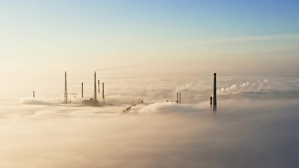 Aerial View of Factory in Mist alt