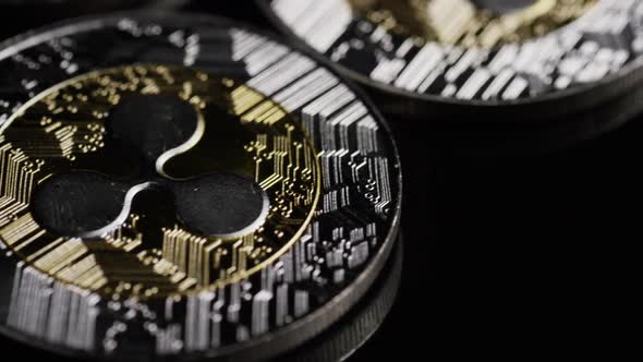 Rotating shot of Bitcoins  alt