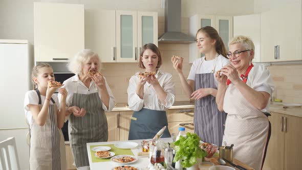 Happy Family Women of Different Generations Enjoy Eating Pizza Together