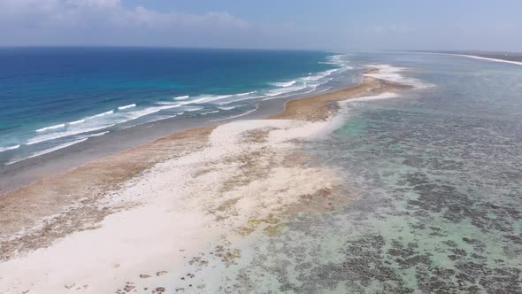 Ocean Coastline and Barrier Reef at Low Tide Zanzibar Matemwe Aerial View alt