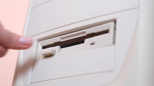 Close Up of Removable Floppy Disk By Hand in Vintage Pc alt