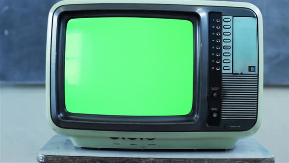 Old TV Set with Green Screen in Classroom. 4K Version. alt