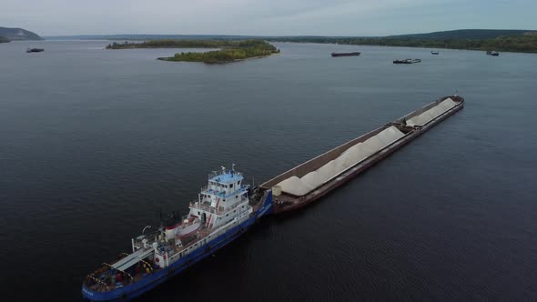 Aerial view of dry cargo ship at anchor on Volga river.