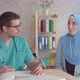 Portrait Young Muslim Woman in Hijab at a Doctor's Appointment Men