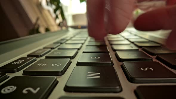 Fingers Pressing Buttons, Typing Text on Keyboard of Laptop, Communicating Online During Working alt