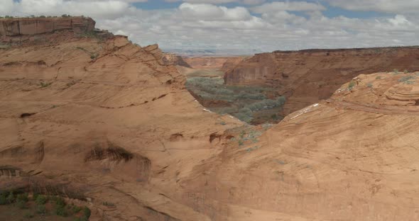 Slow rise revealing Canyon de Chelly National Monument alt