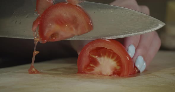 Slicing Tomatoes with a Knife