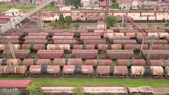 Drone, marshalling yard. there are a lot of railway cars there. depot. Trains . alt