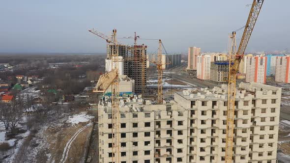 Construction Site with a Bird's Eye. Flying Over the Construction Site. The Construction of the
