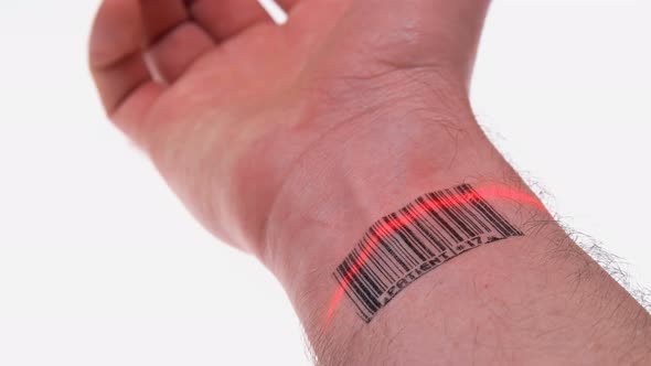 the Scanner Scans the Wrist of a Person with a Barcode Labeled Patient alt