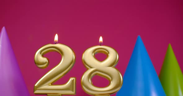 Burning Birthday Cake Candle Number 28