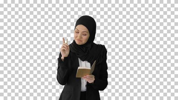 Muslim Businesswoman thinking and writing, Alpha Channel alt