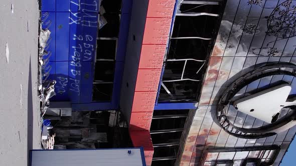 Vertical Video of a Bombed Shopping Center During the War in Bucha Ukraine alt
