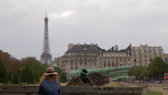Paris view with Eiffel Tower and old cannons near Les Invalides, France alt