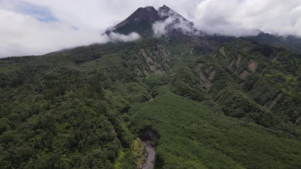 Aerial view of active Merapi mountain with clear sky in Indonesia alt