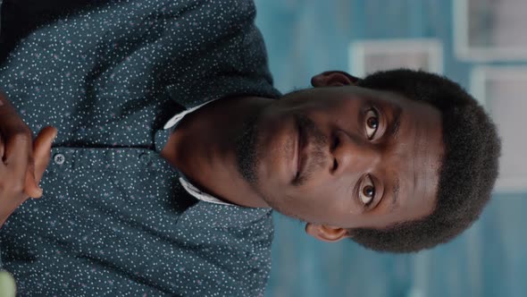 Vertical Video POV Man Talking with His Colleagues on Online Internet Video Conference Call alt