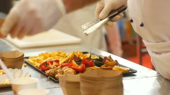 Chef Serves Baked Vegetables